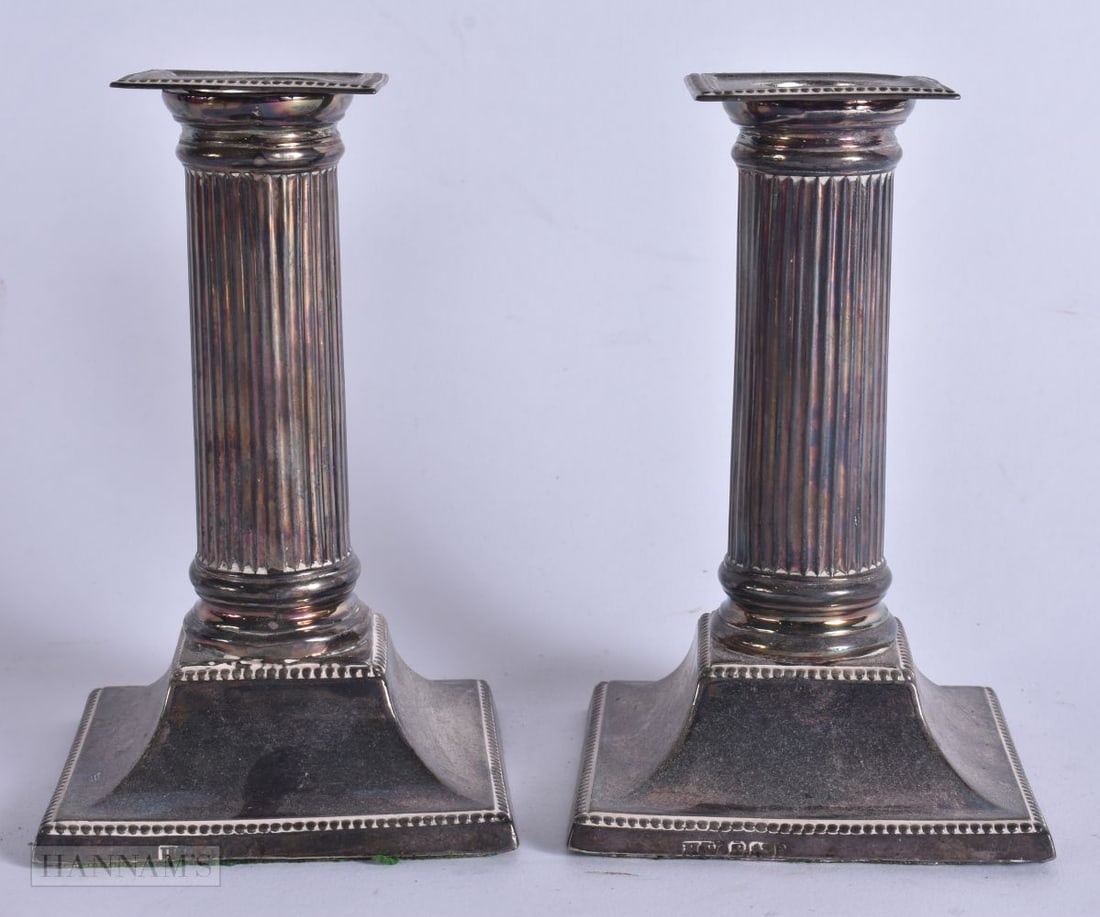 A PAIR OF SILVER CORINTHIAN COLUMN CANDLESTICKS. 600 grams overall. 14 cm high. (1 of 5)
