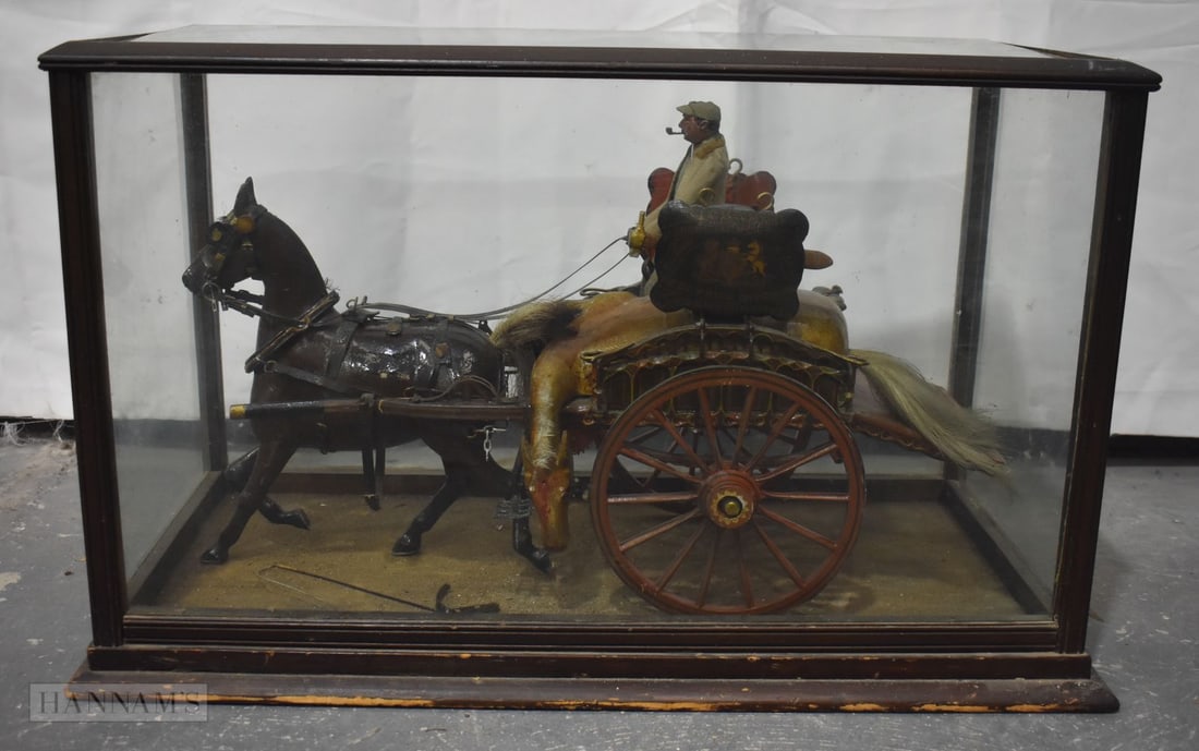 A RARE LARGE ANTIQUE FOLK ART 'HORSE SLAUGHTERER' WOOD AND PAPIER MACHE STUDY contained within a gla (1 of 11)