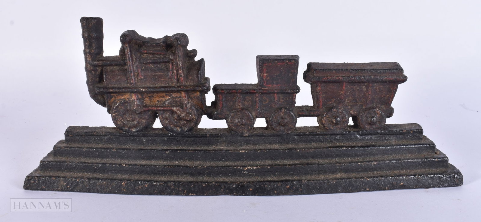 A RARE VICTORIAN PAINTED CAST IRON LOCOMOTIVE DOOR STOP. 27 cm wide. (1 of 4)