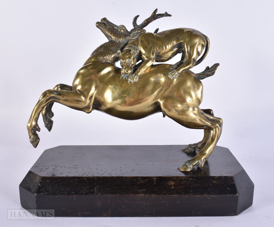 AN 18TH/19TH CENTURY ITALIAN BRONZE FIGURE OF A STAG possibly after Antonio Susini. 21 cm x 19 cm.: AN 18TH/19TH CENTURY ITALIAN BRONZE FIGURE OF A STAG possibly after Antonio Susini. 21 cm x 19 cm.