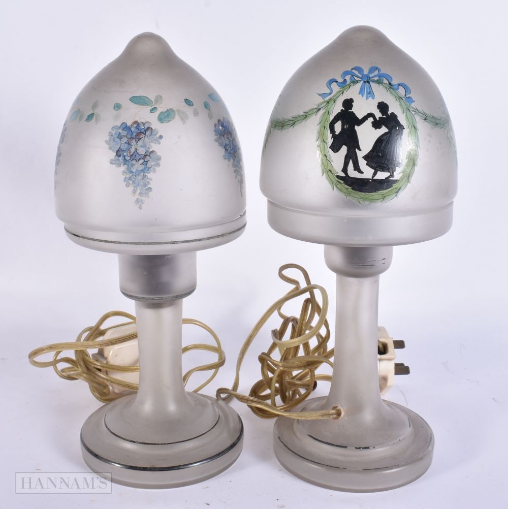 AN UNUSUAL PAIR OF ART DECO PAINTED GLASS LAMPS. 29 cm high. (1 of 4)