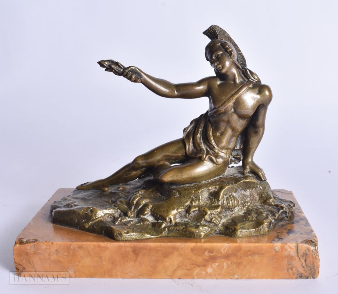 A 19TH CENTURY GRAND TOUR BRONZE FIGURE OF A SEATED MALE modelled upon a sienna marble base. 15 cm x: A 19TH CENTURY GRAND TOUR BRONZE FIGURE OF A SEATED MALE modelled upon a sienna marble base. 15 cm x 13 cm.