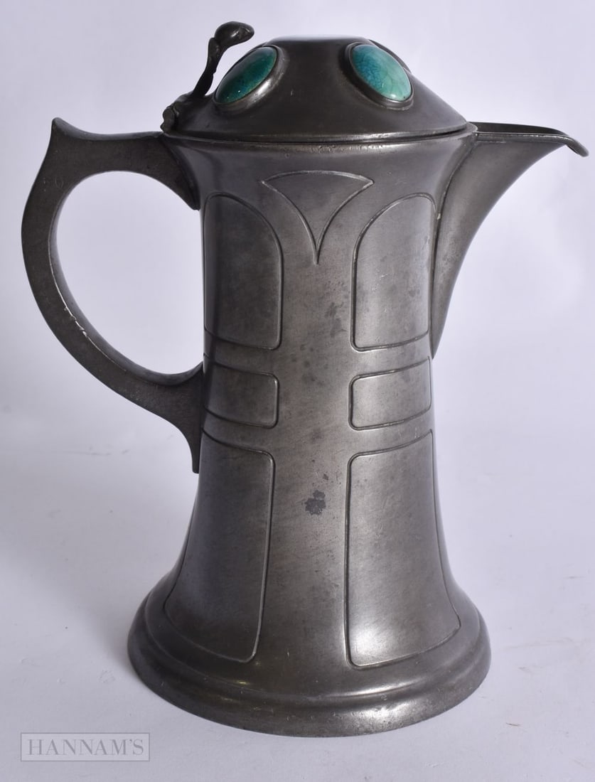 AN ART DECO PEWTER AND RUSKIN POTTERY JUG. 21 cm high. (1 of 7)
