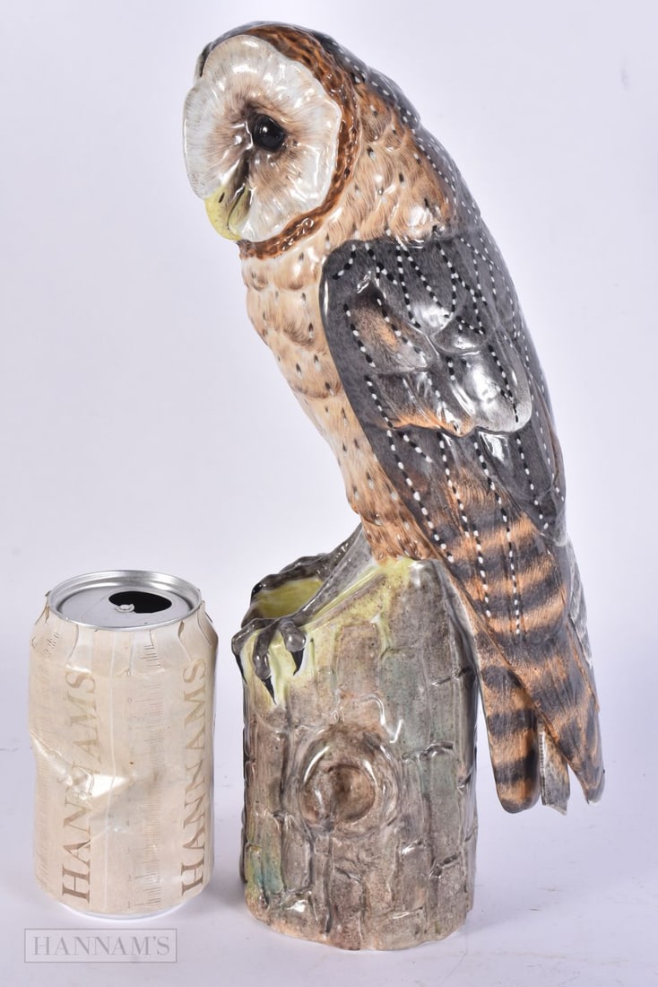 A LOVELY LARGE ANTIQUE PORCELAIN FIGURE OF AN OWL. 30 cm high.: A LOVELY LARGE ANTIQUE PORCELAIN FIGURE OF AN OWL. 30 cm high.