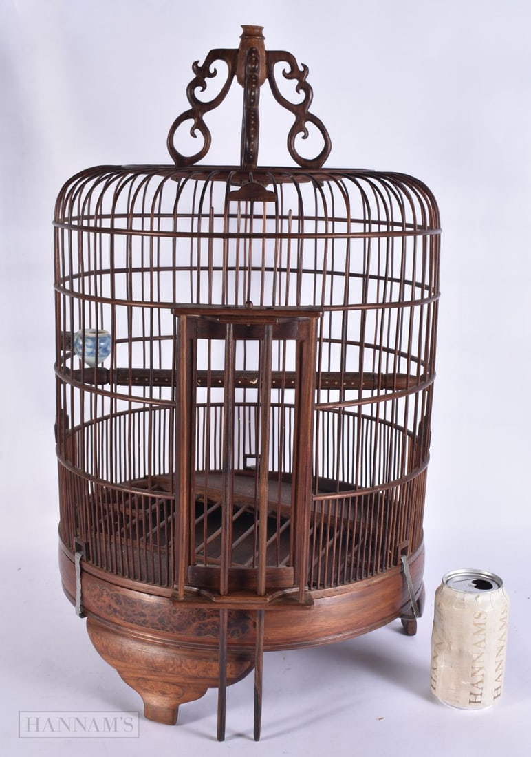 A LARGE CHINESE HUANGHUALI AND BURR WOOD BIRD CAGE with blue and white porcelain feeder. 68 cm x 34 (1 of 5)