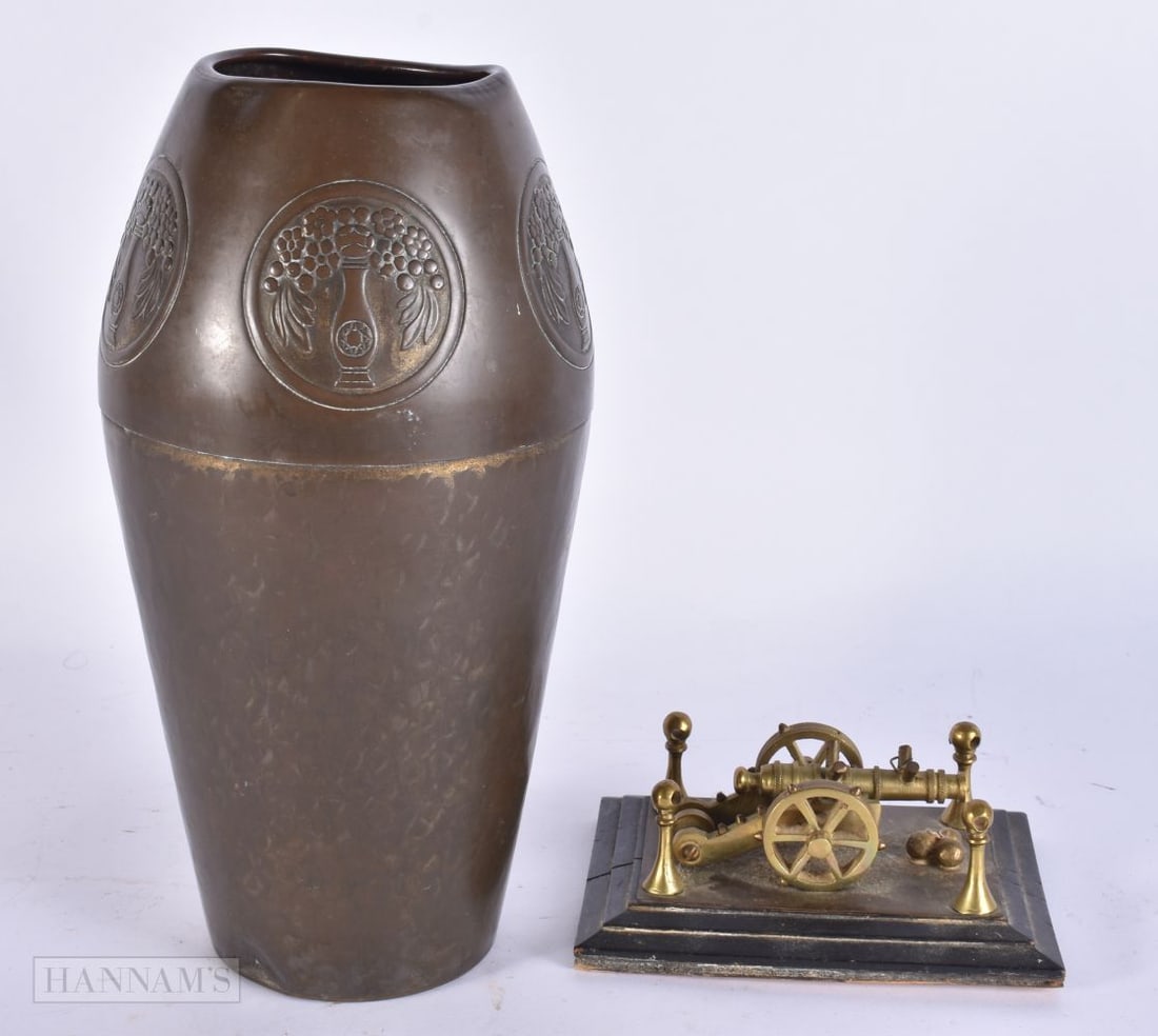 AN ART DECO WMF COPPER VASE together with a military interest bronze model of a cannon. Largest 26.5 (1 of 8)