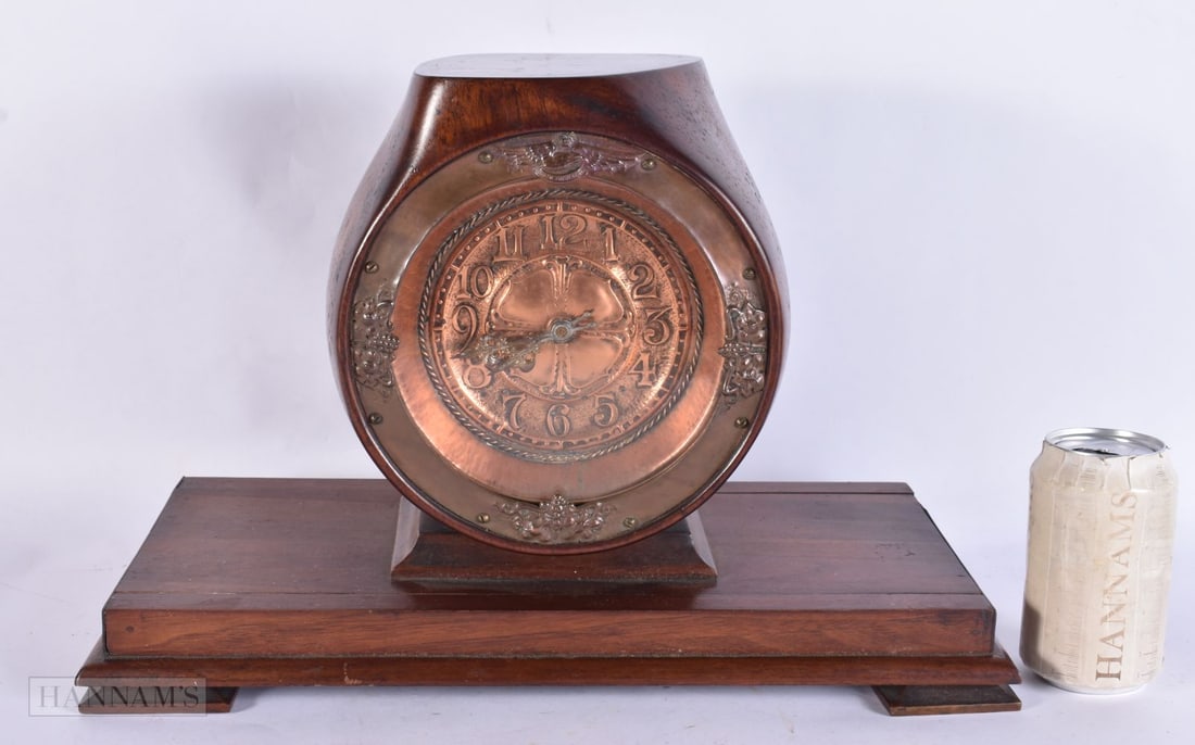 A RARE EARLY 20TH CENTURY ROYAL AIR FORCE ARTS AND CRAFTS COPPER CLOCK formed from a propellor. 40 c (1 of 7)