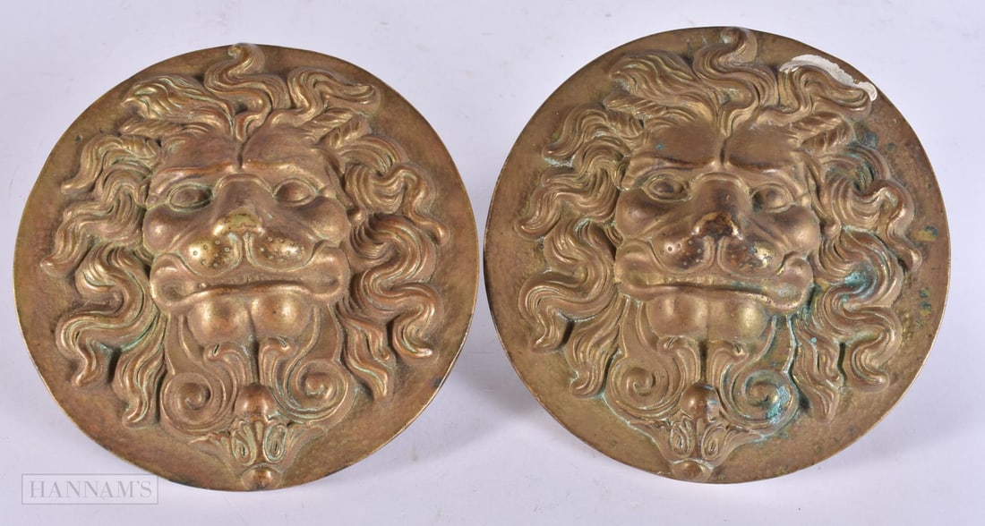 A PAIR OF MID 19TH CENTURY BRONZE LION MASK HEAD ROUNDELS. 15 cm wide. (1 of 4)