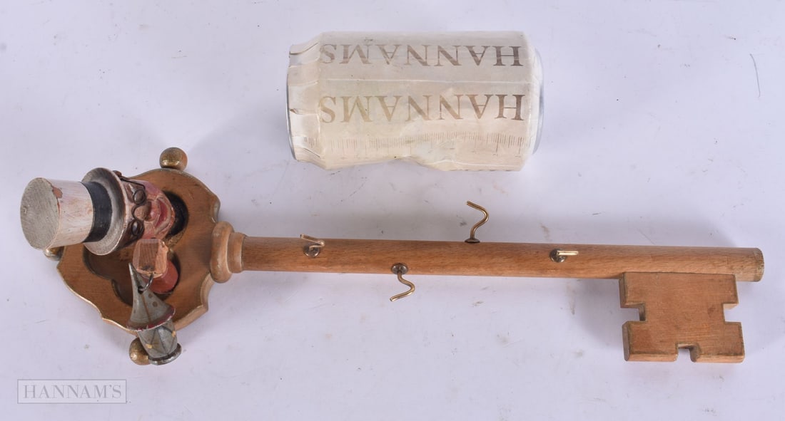 AN UNUSUAL ART DECO BAVARIAN BLACK FOREST KEY RACK. 34 cm long.: AN UNUSUAL ART DECO BAVARIAN BLACK FOREST KEY RACK. 34 cm long.