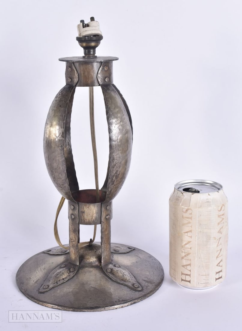 AN ARTS AND CRAFTS HAMMERED LAMP. 30 cm high. (1 of 4)