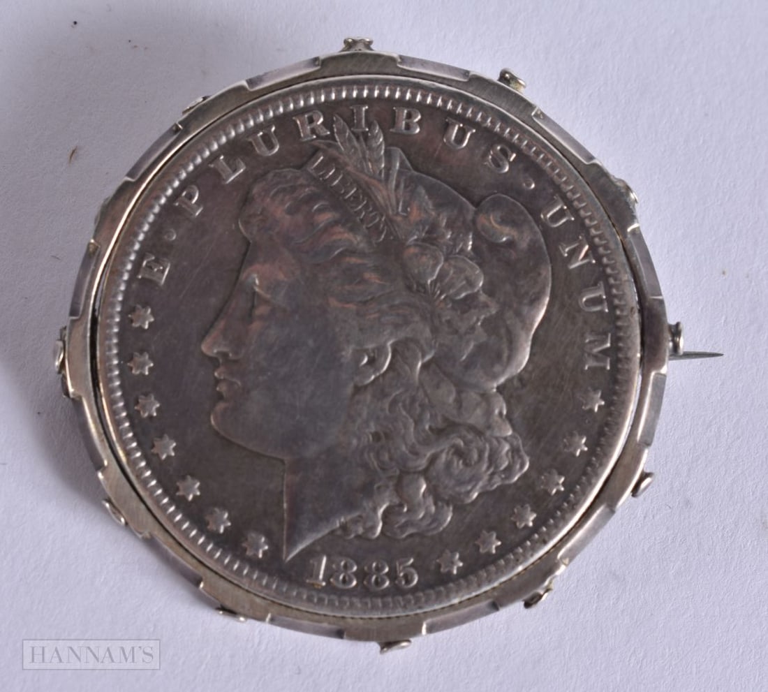 A VICTORIAN SILVER COIN BROOCH. 31 grams. 4.25 cm wide.: A VICTORIAN SILVER COIN BROOCH. 31 grams. 4.25 cm wide.