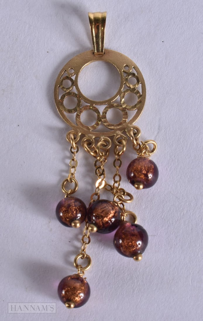 A 9CT GOLD PENDANT. 3.5 grams. 6.25 cm x 1.75 cm.: A 9CT GOLD PENDANT. 3.5 grams. 6.25 cm x 1.75 cm.