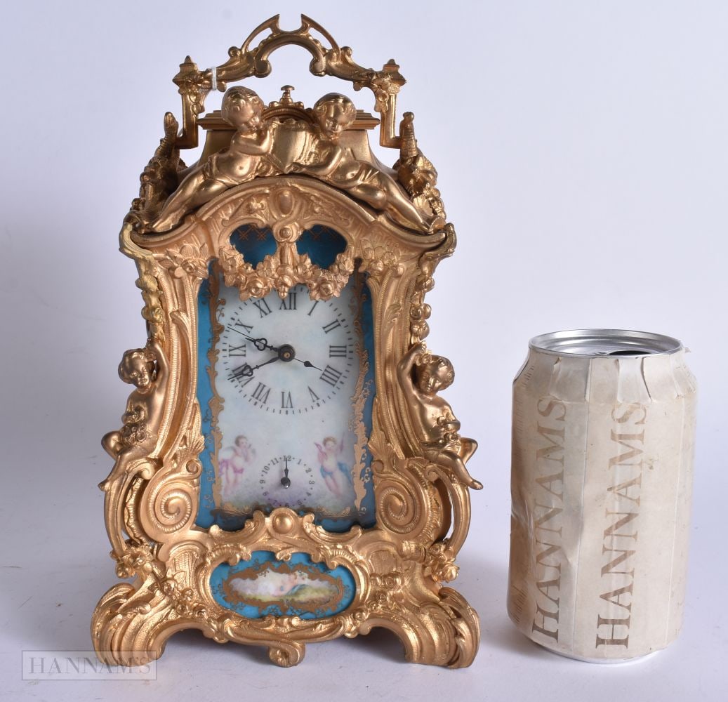 A CONTINENTAL SEVRES STYLE BRONZE CARRIAGE CLOCK. Working. 23 cm high inc handle. (1 of 8)