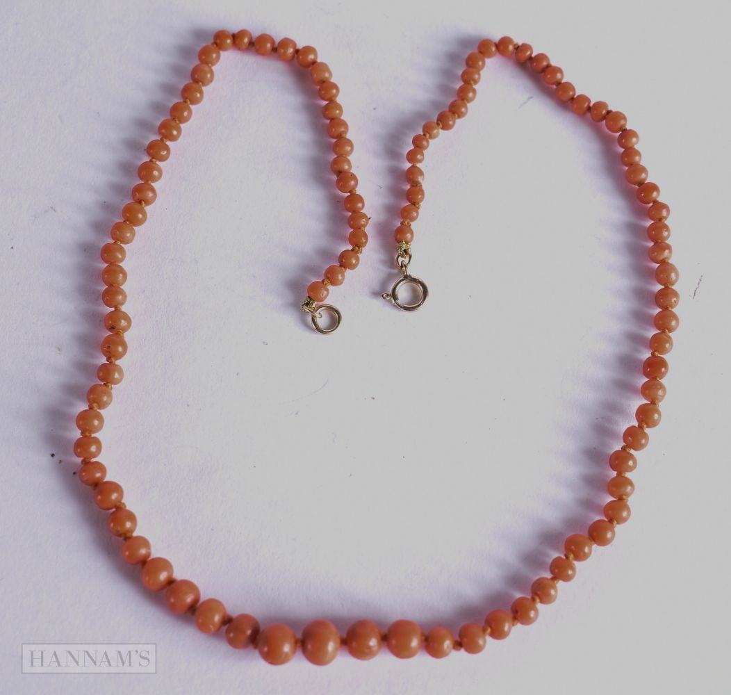 AN ANTIQUE CORAL NECKLACE. 12.5 grams. 47 cm long. (1 of 3)