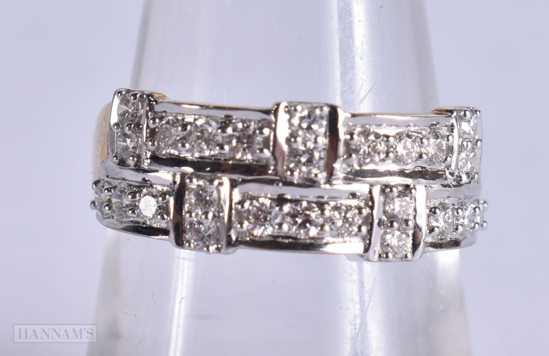 A 10CT GOLD AND DIAMOND RING. O. 2.3 grams. (1 of 4)
