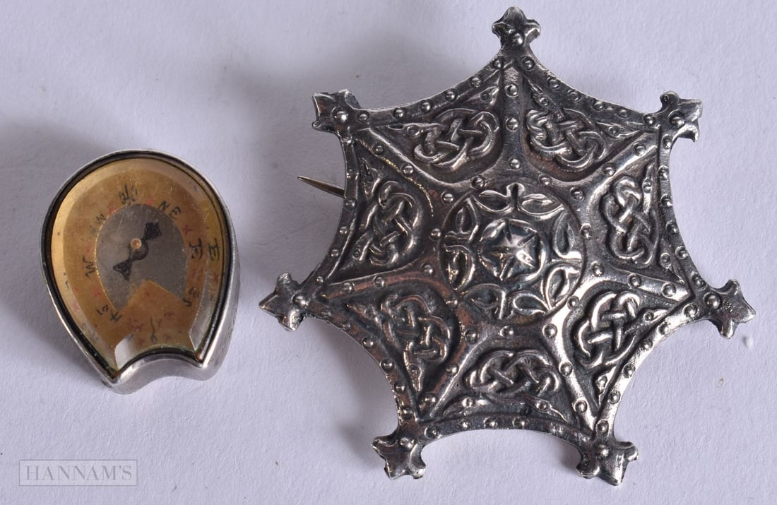 A SILVER BROOCH and a silver cased compass. 44 grams. (2) (1 of 4)