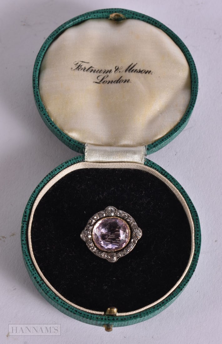 A VICTORIAN DIAMOND AND PINK SAPPHIRE BROOCH. 5.4 grams. 2.25 cm x 2 cm.: A VICTORIAN DIAMOND AND PINK SAPPHIRE BROOCH. 5.4 grams. 2.25 cm x 2 cm.
