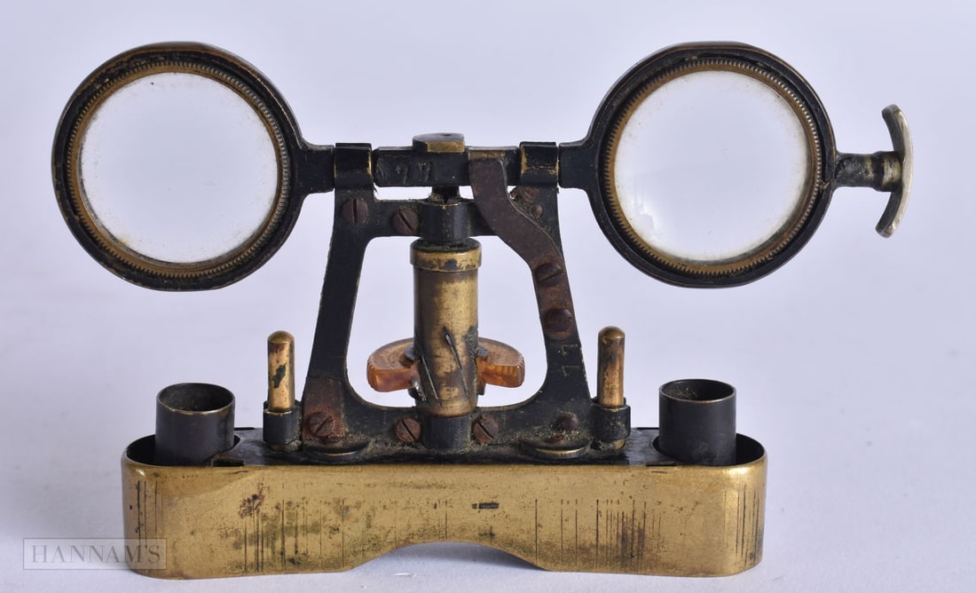 AN OPTICAL INSTRUMENT. 10 cm x 6.5 cm. (1 of 3)