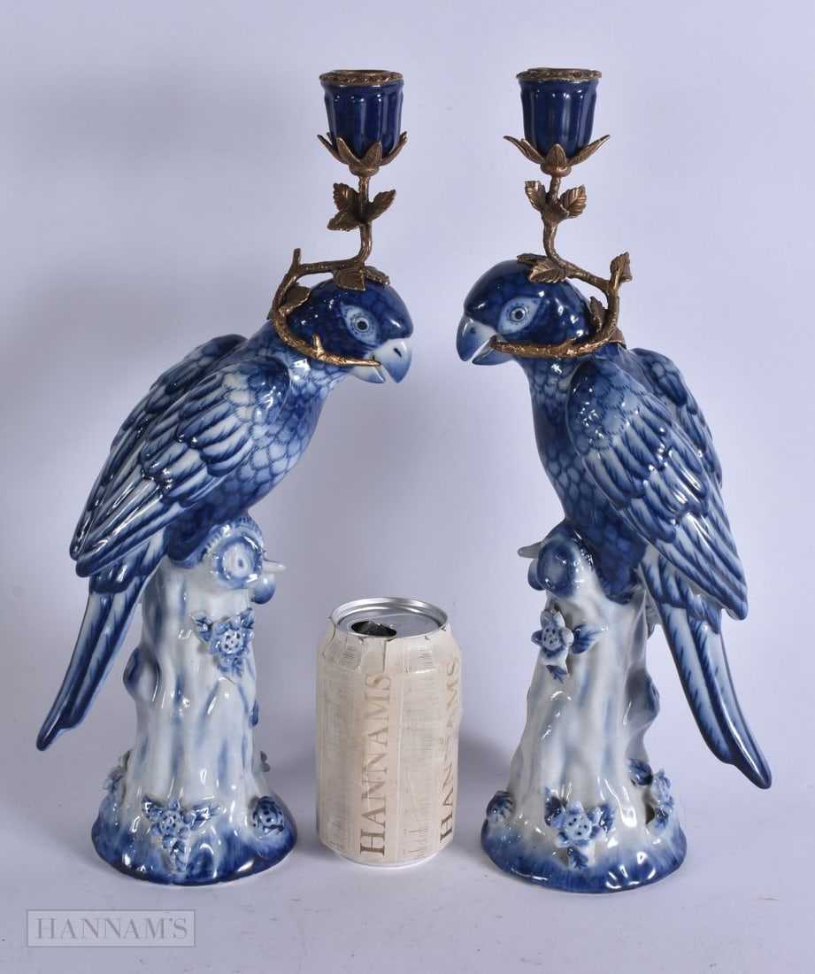 A PAIR OF CONTINENTAL PARROT POTTERY CANDLESTICKS. 35 cm high. (1 of 5)