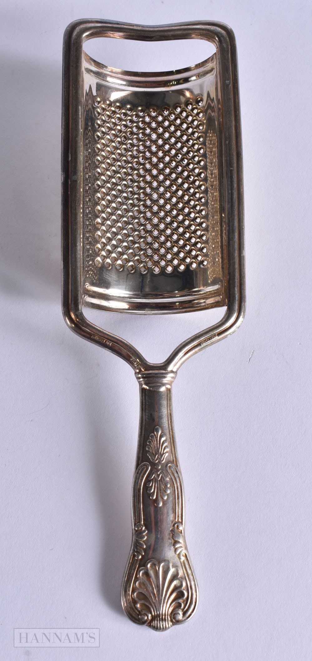 A SILVER PLATED CHEESE GRATER. 18 cm long.: A SILVER PLATED CHEESE GRATER. 18 cm long.