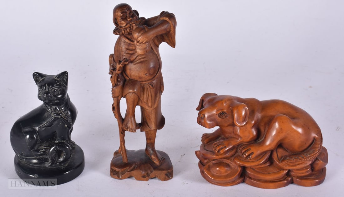 AN EARLY 20TH CENTURY JAPANESE MEIJI PERIOD WOOD OKIMONO together with two other carvings. Largest 1 (1 of 4)