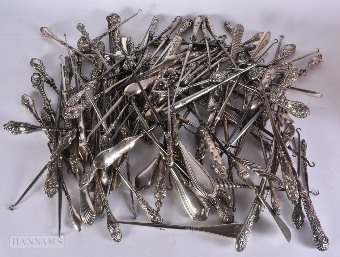 A MASSIVE COLLECTION OF ANTIQUE SILVER HANDLED BUTTON HOOKS in various forms and sizes. 5.7 kgs appr (1 of 5)