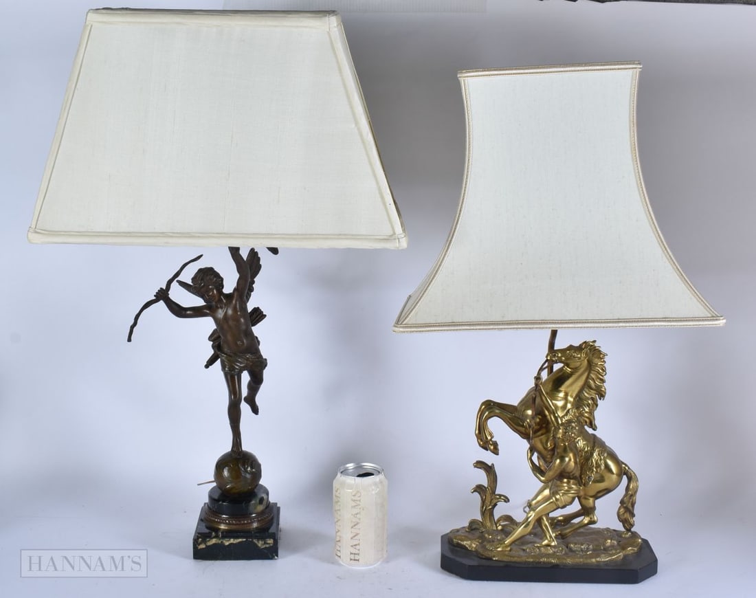 A VICTORIAN BRONZE MARLEY HORSE LAMP together with a spelter cherub lamp. Largest 46 cm high. (2) (1 of 3)