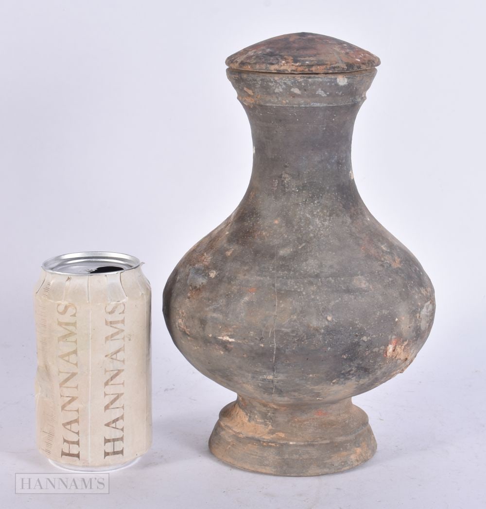 A CHINESE HAN DYNASTY VASE AND COVER 202 BC - 220 CE. 24 cm high. (1 of 4)