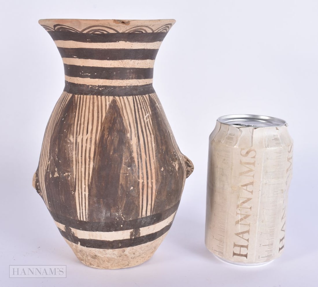 A CHINESE NEOLITHIC PERIOD POTTERY VASE painted with black motifs. 19 cm high.: A CHINESE NEOLITHIC PERIOD POTTERY VASE painted with black motifs. 19 cm high.