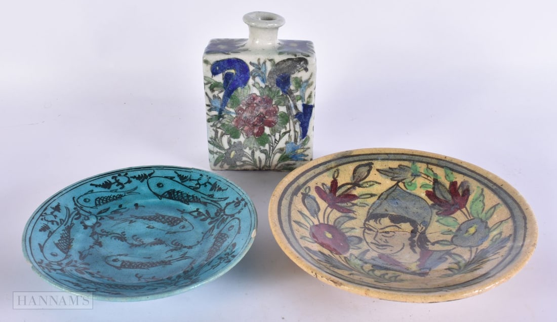 A 19TH CENTURY PERSIAN QAJAR POTTERY DISH together with a similar bottle vase & a blue glazed fish p (1 of 8)