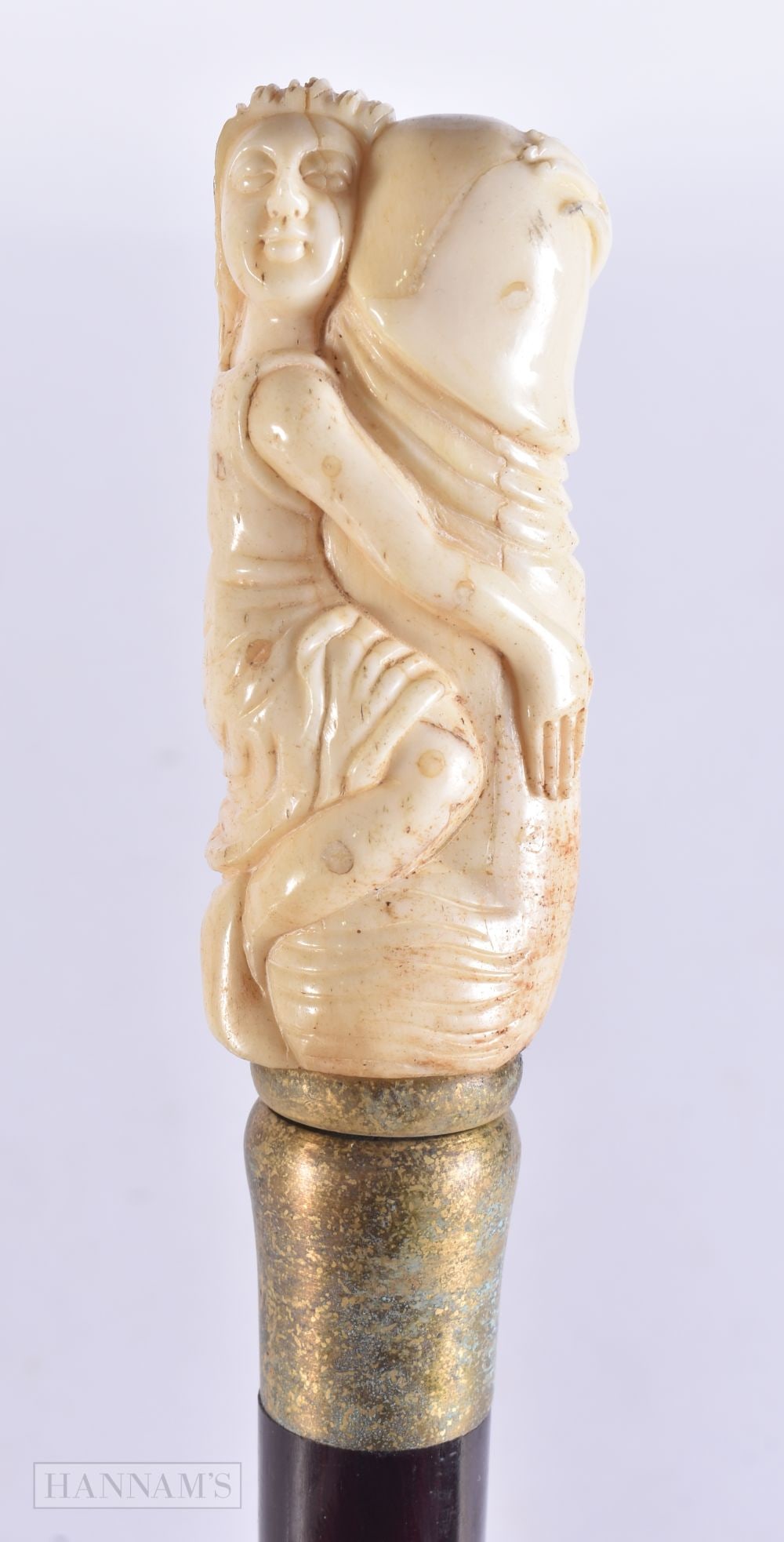 A CARVED BONE WALKING CANE. 90 cm long.: A CARVED BONE WALKING CANE. 90 cm long.