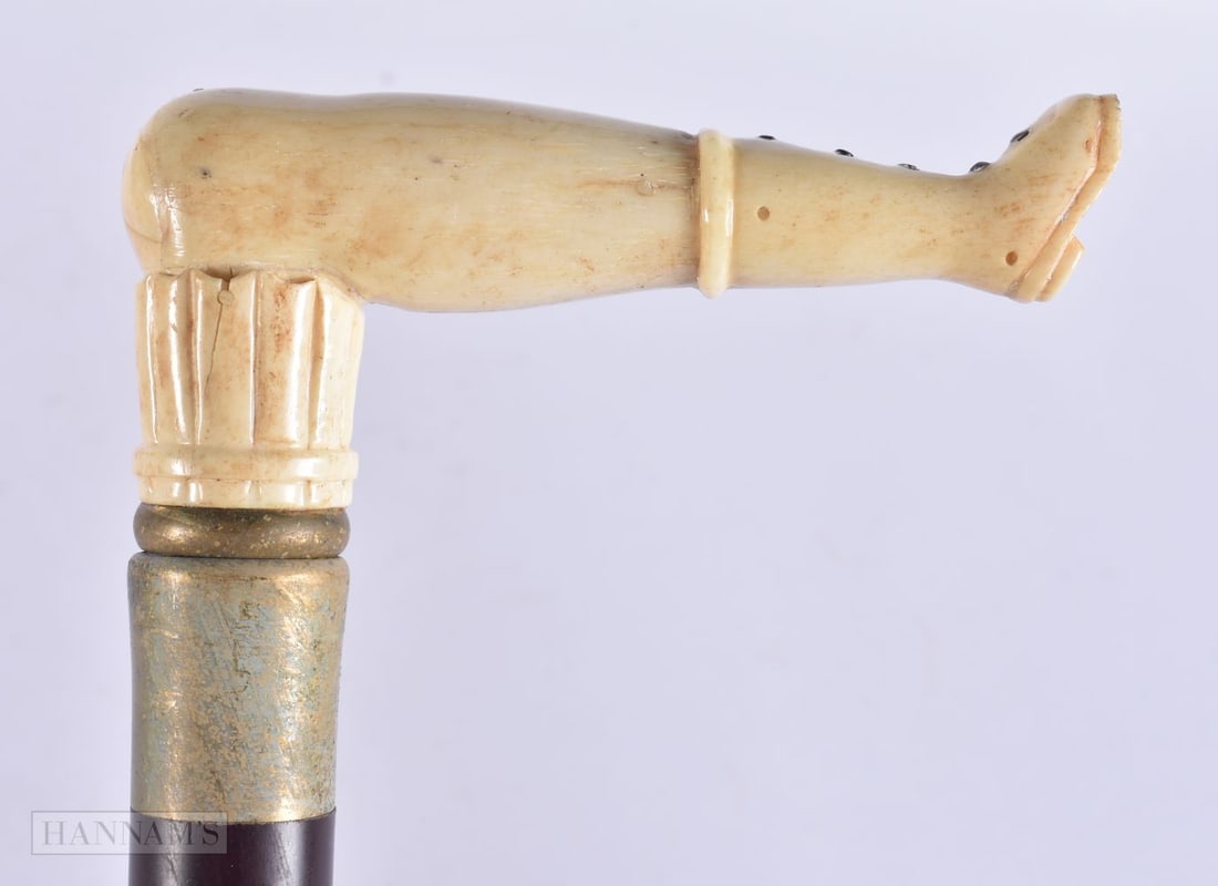 A CARVED BONE WALKING CANE. 90 cm long.: A CARVED BONE WALKING CANE. 90 cm long.