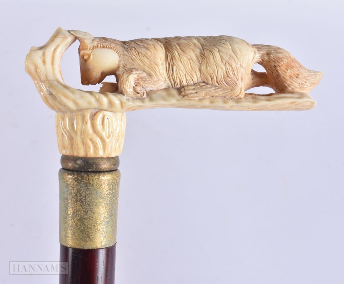 A CARVED BONE WALKING CANE. 90 cm long.: A CARVED BONE WALKING CANE. 90 cm long.