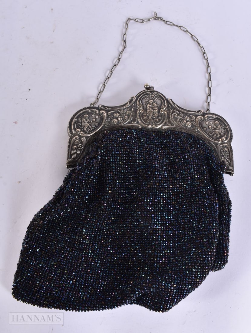 A VICTORIAN SILVER PLATED BEADWORK PURSE. 26 cm x 22 cm.: A VICTORIAN SILVER PLATED BEADWORK PURSE. 26 cm x 22 cm.