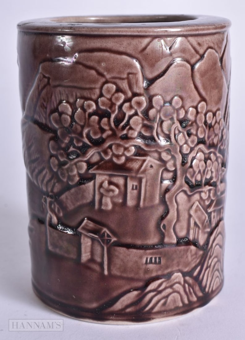 AN EARLY 20TH CENTURY CHINESE AUBERGINE GLAZED MOULDED PORCELAIN BRUSH POT Late Qing. 12 cm high.: AN EARLY 20TH CENTURY CHINESE AUBERGINE GLAZED MOULDED PORCELAIN BRUSH POT Late Qing. 12 cm high.