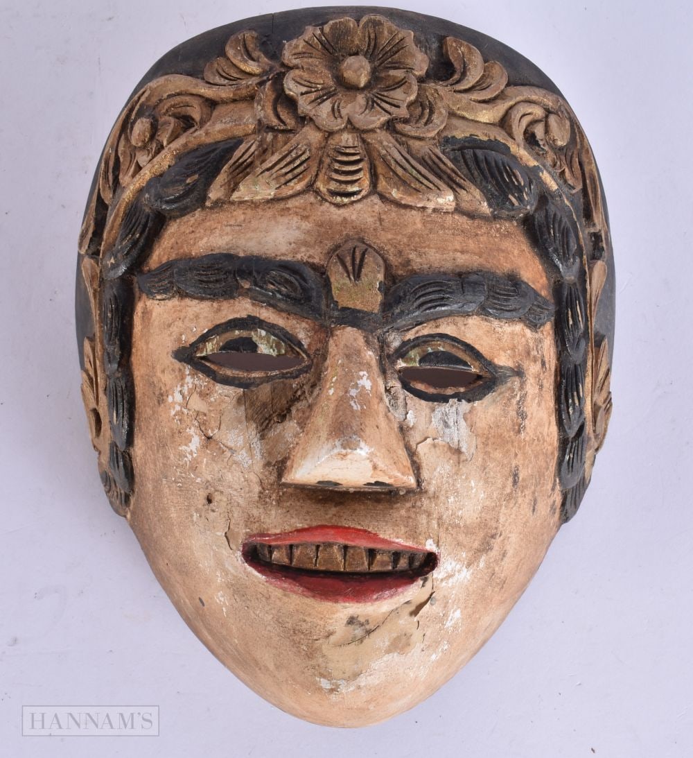A JAVANESE PAINTED WOOD MASK. 18 cm x 14 cm. (1 of 4)