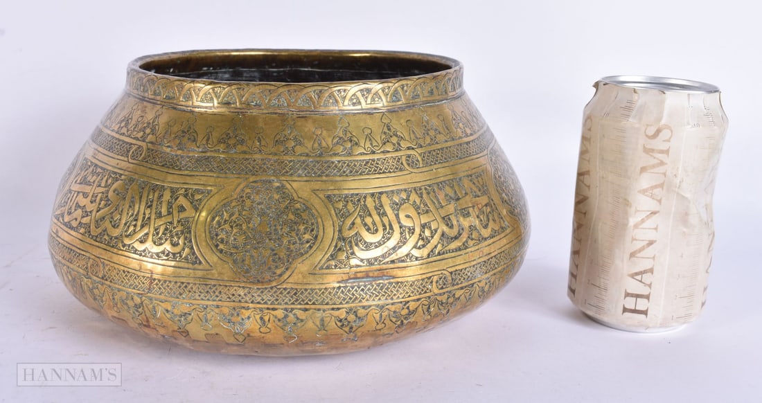 A 19TH CENTURY ISLAMIC MIDDLE EASTERN JAR decorated with Kufic scripture. 24 cm x 12 cm. (1 of 6)