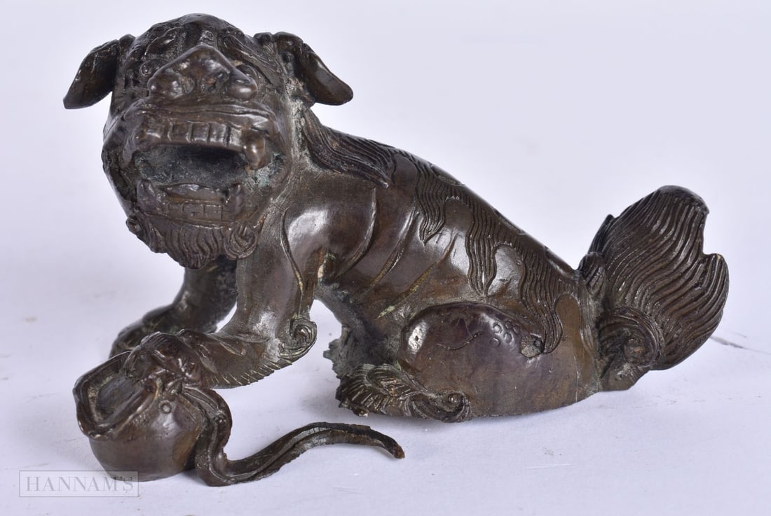 A 17TH/18TH CENTURY CHINESE BRONZE BUDDHISTIC LION Ming/Early Qing. 9.5 cm x 7 cm.: A 17TH/18TH CENTURY CHINESE BRONZE BUDDHISTIC LION Ming/Early Qing. 9.5 cm x 7 cm.