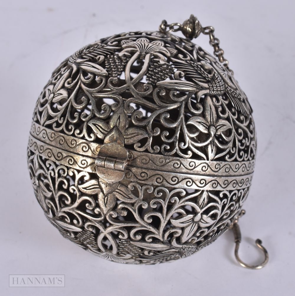 A CHINESE WHITE METAL TRAVELLING CENSER. 10 cm wide. (1 of 3)