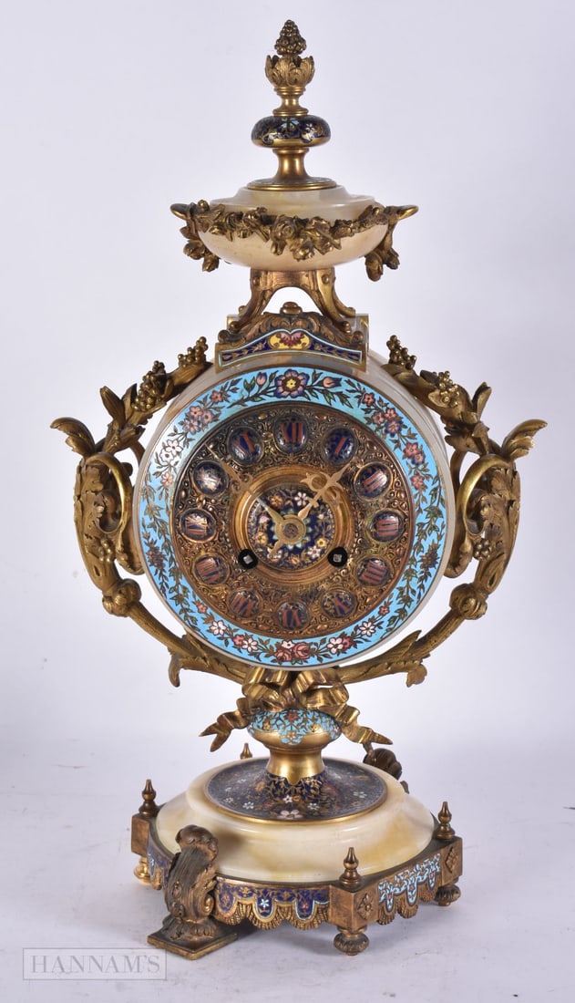 A FINE 19TH CENTURY FRENCH GILT BRONZE AND CHAMPLEVE ENAMEL MANTEL CLOCK formed with stylised floral (1 of 8)