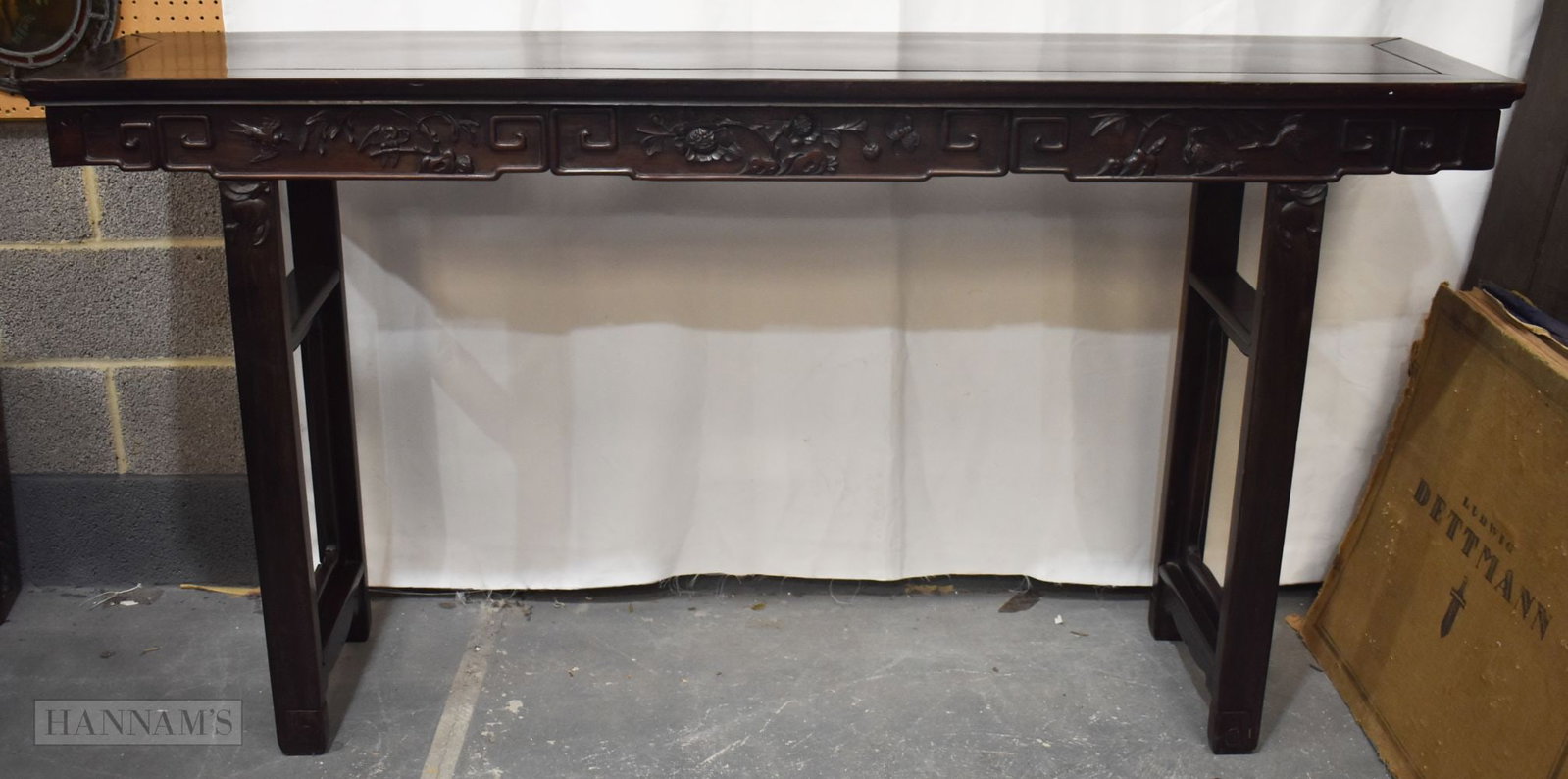 A LARGE 19TH CENTURY CHINESE CARVED HARDWOOD ALTAR TABLE Qing. 107 cm x 205 cm x 43 cm.: A LARGE 19TH CENTURY CHINESE CARVED HARDWOOD ALTAR TABLE Qing. 107 cm x 205 cm x 43 cm.
