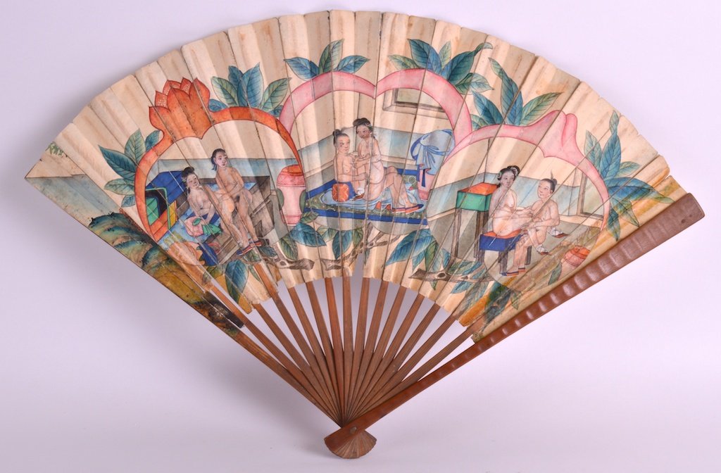 AN EARLY 20TH CENTURY CHINESE CARVED BAMBOO FAN painted: AN EARLY 20TH CENTURY CHINESE CARVED BAMBOO FAN painted with a female standing beside a window within a landscape, the reverse with erotic scenes. 1ft 7ins extended.