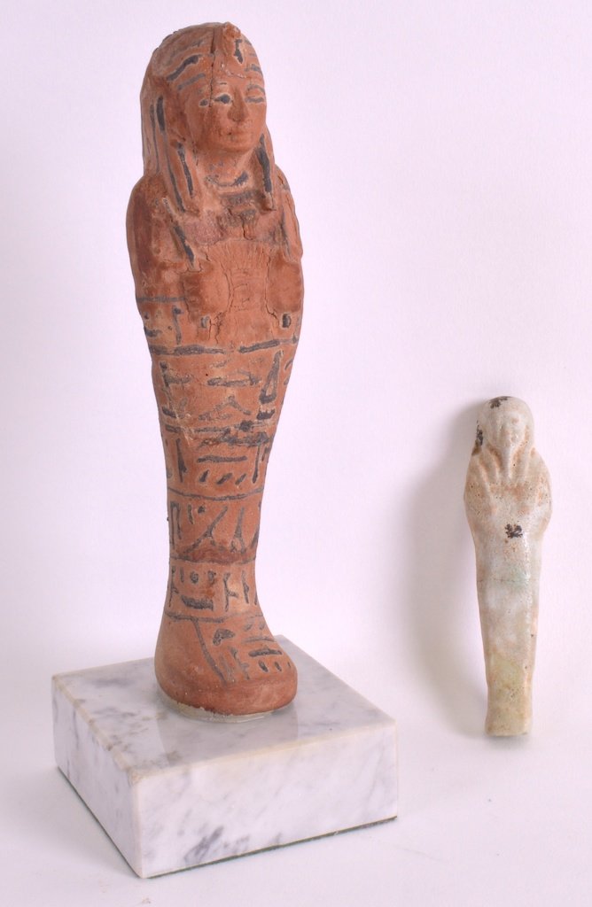 A 19TH CENTURY EGYPTIAN GRAND TOUR POLYCHROMED USHABTI: A 19TH CENTURY EGYPTIAN GRAND TOUR POLYCHROMED USHABTI together with a faience glazed shabti. 7.5ins & 4.25ins high. (2) £50-75