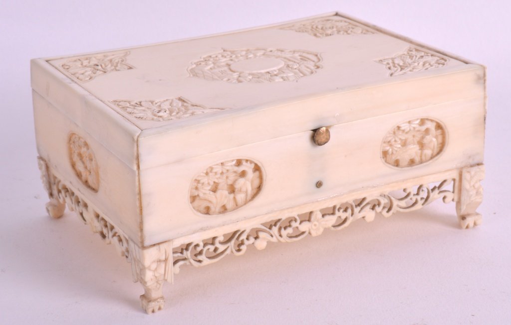A SMALL 19TH CENTURY CHINESE CANTON IVORY CASKET of: A SMALL 19TH CENTURY CHINESE CANTON IVORY CASKET of rectangular form, carved with panels of figures and foliage. 4.25ins x 3ins.