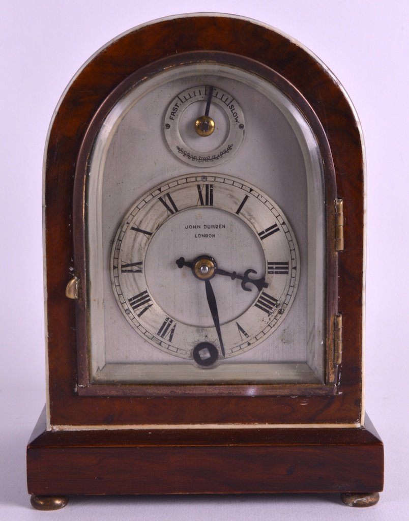 AN EDWARDIAN ROSEWOOD MANTEL CLOCK BY JOHN DURDEN OF: AN EDWARDIAN ROSEWOOD MANTEL CLOCK BY JOHN DURDEN OF LONDON with black painted numerals and subsidiary dial. 6.75ins high.
