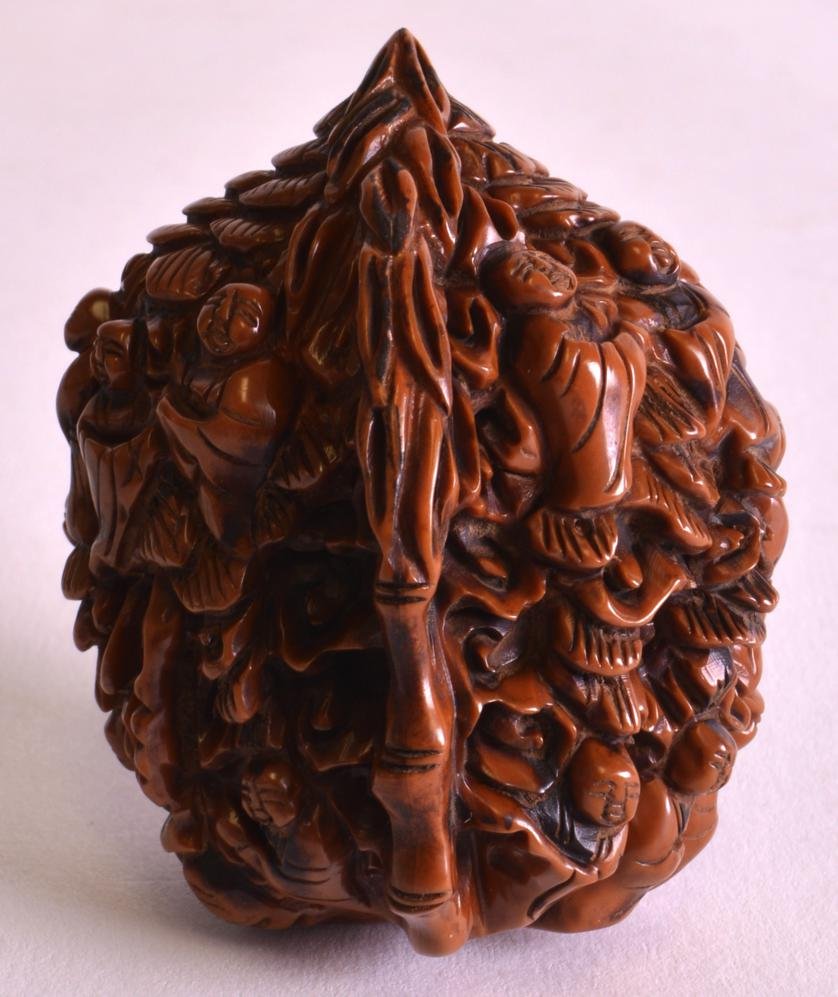 A 19TH CENTURY CHINESE CARVED NUT decorated all over (1 of 4)