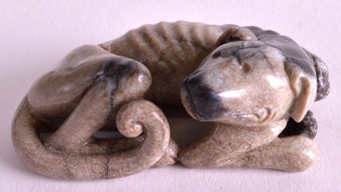 A 19TH CENTURY CHINESE CARVED BLACK JADE FIGURE OF A (1 of 3)