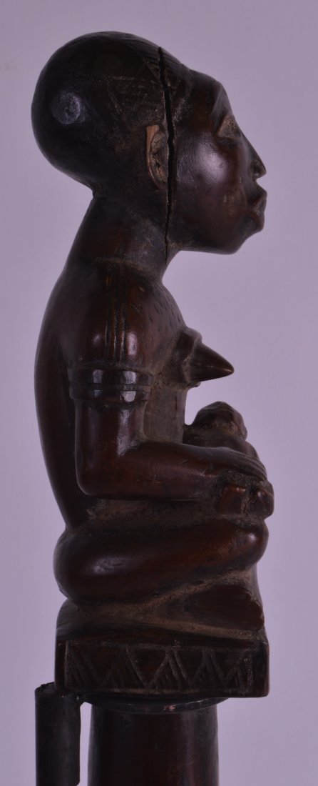 AN EARLY 20TH CENTURY AFRICAN CARVED TRIBAL FERTILITY (1 of 2)