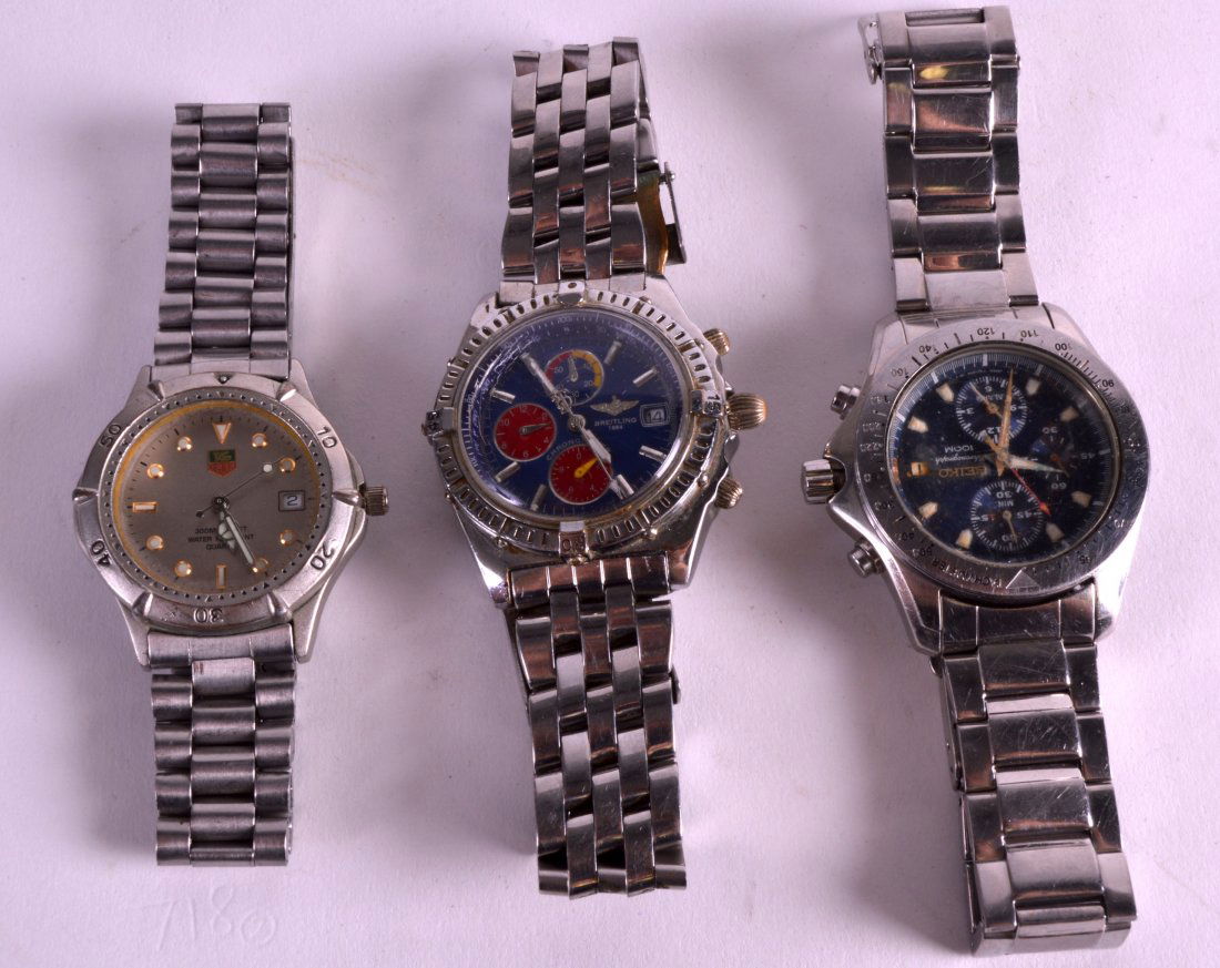 A STEEL CASED 'BREITLING' WRISTWATCH together with a (1 of 1)