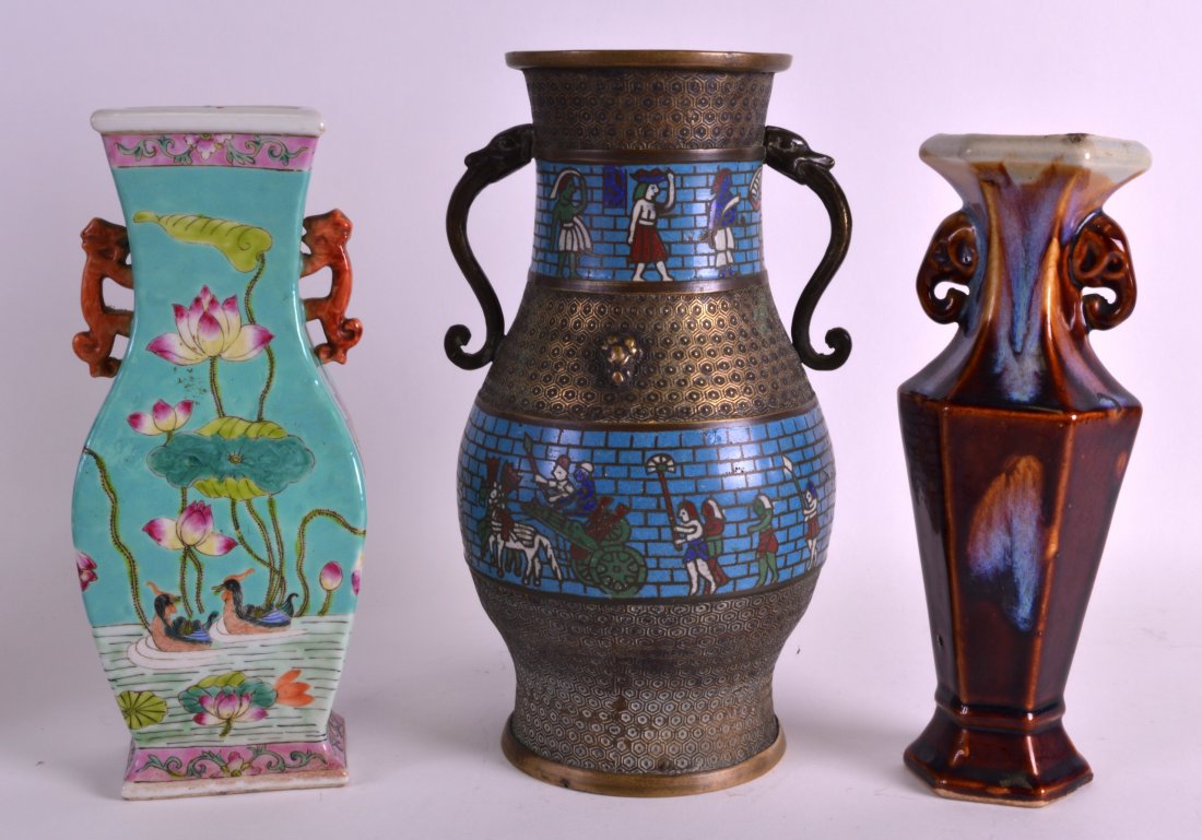 A LATE 19TH CENTURY CHAMPLEVE ENAMEL VASE together with: A LATE 19TH CENTURY CHAMPLEVE ENAMEL VASE together with a brown glazed vase & a famille rose vase. (3)